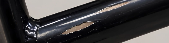 Coating, plating or print that chips, scratches or does not match the sample