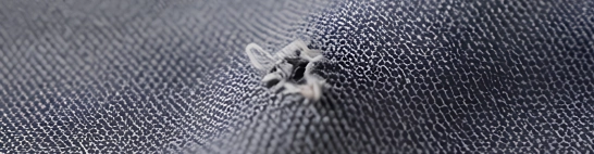 Holes, thin places, slubs and weaving or knitting faults